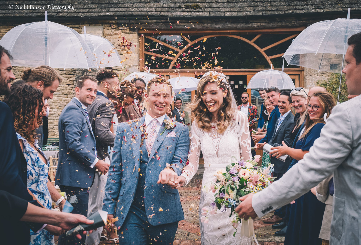 Confetti throw at an Oxleaze Barn Wedding