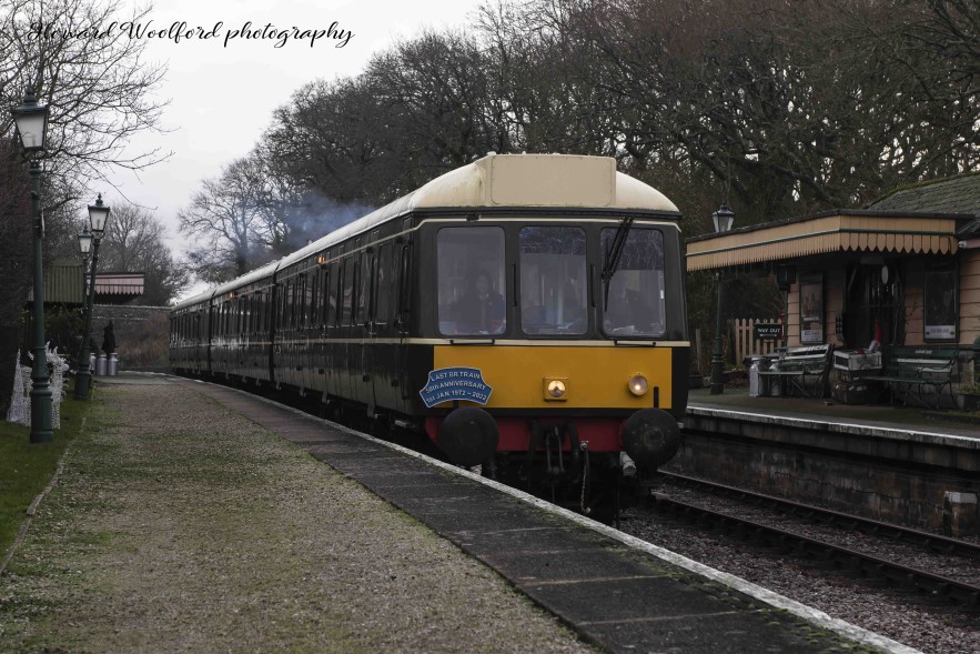 Diesel multiple unit train at Harman's Cross on the Swanage Railway