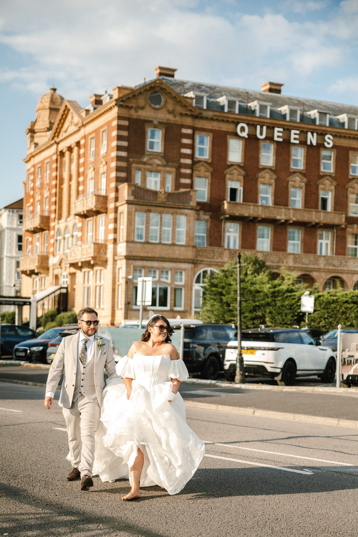 Berkshire wedding photography of a Bride and Groom in a  joyous candid moment on their wedding day 